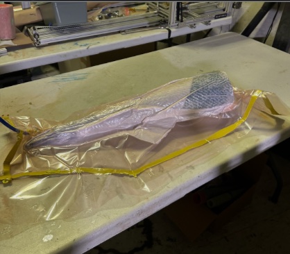 Nose cone in vacuum bag during curing